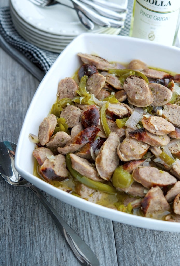 Italian Sausage and Peppers in a White Wine Sauce make the perfect Sunday afternoon meal or tasty sandwiches for tailgating.
