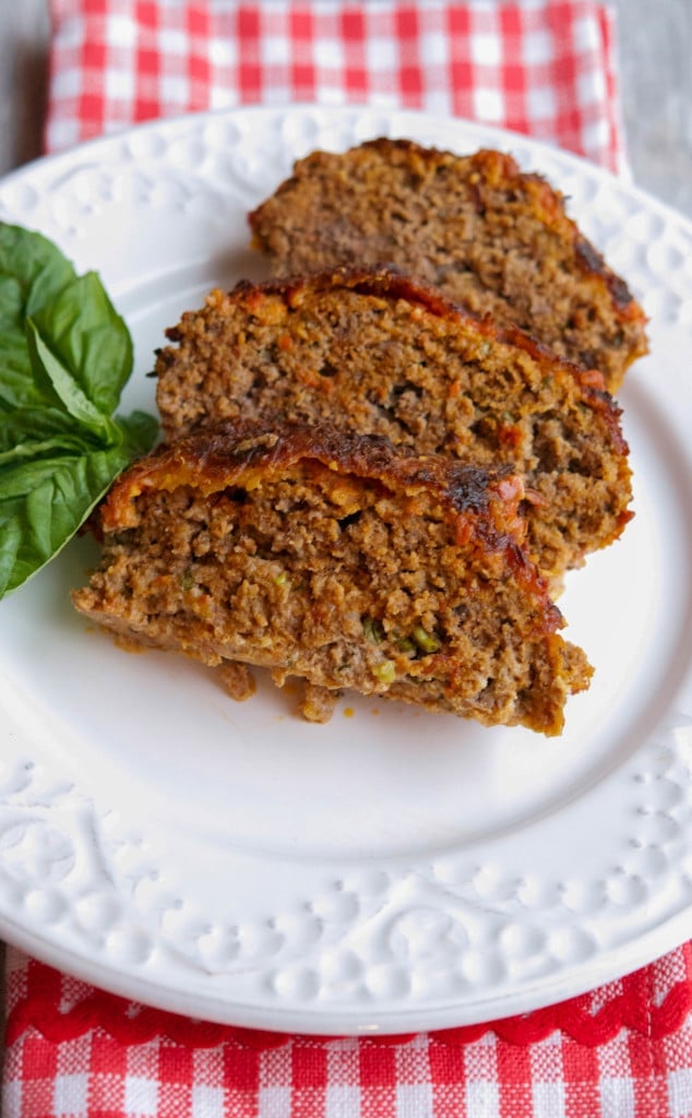 Pizza Meatloaf sliced on a white plate. 