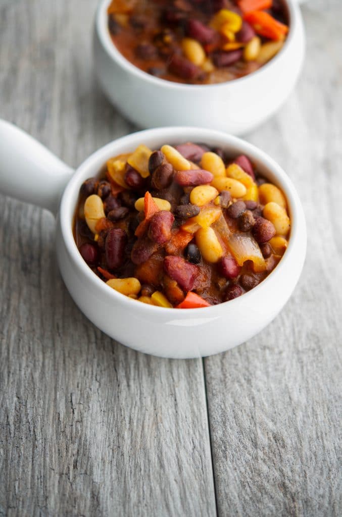 Beans are healthy and so versatile; especially in recipes like this Slow Cooker Vegetarian Three Bean Chili made with three types of beans, tomatoes, peppers and onions.