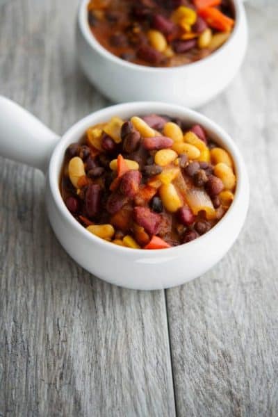 Vegetarian Three Bean Chili in a white soup crock.