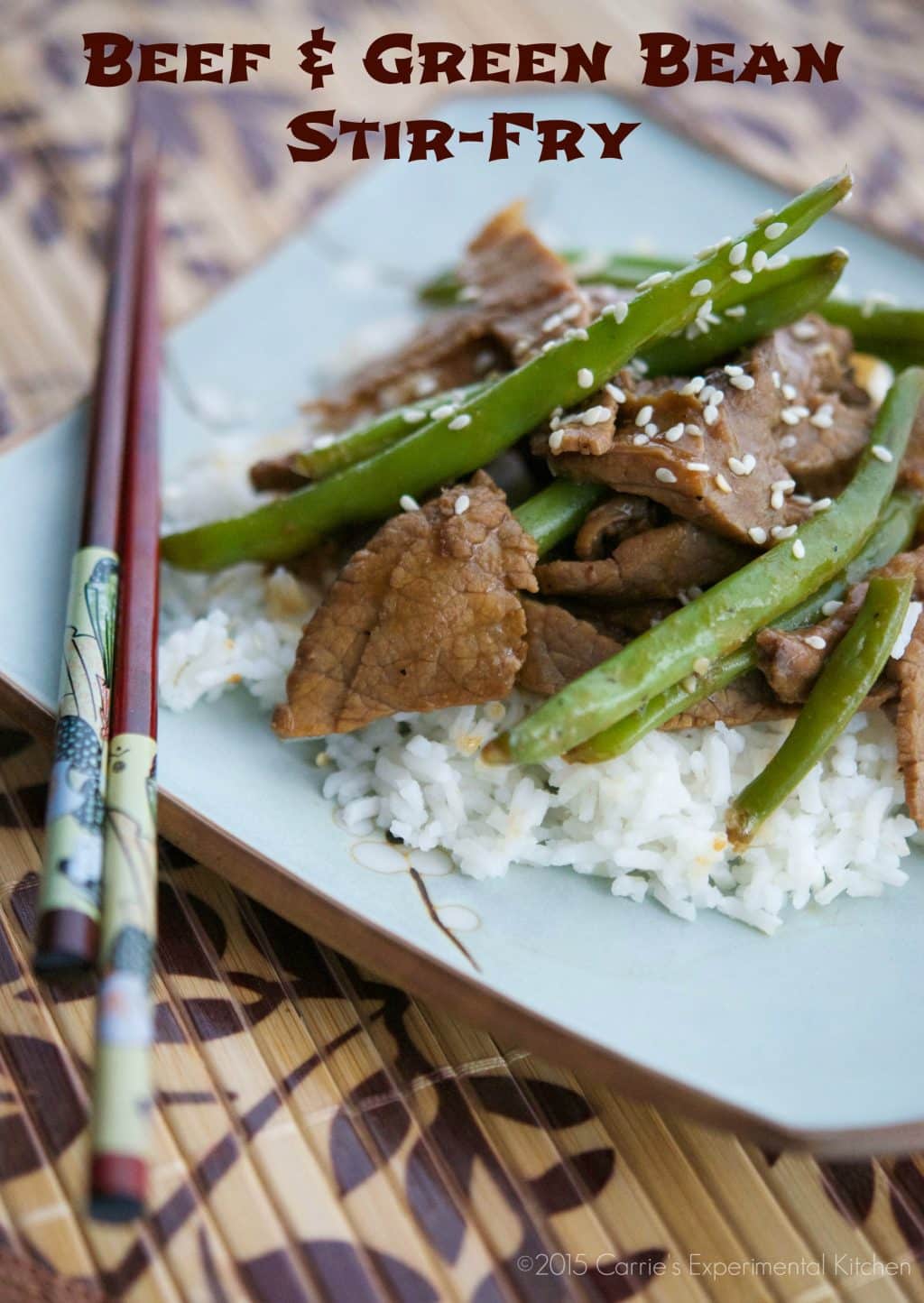 A plate of food with beef, broccoli and rice. 