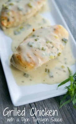 Grilled Chicken with a Dijon Tarragon Sauce on a platter. 