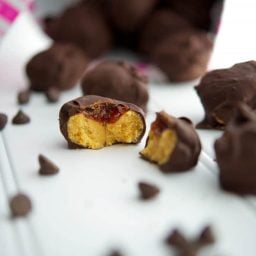 A close up of the inside of peanut butter and jelly truffles.
