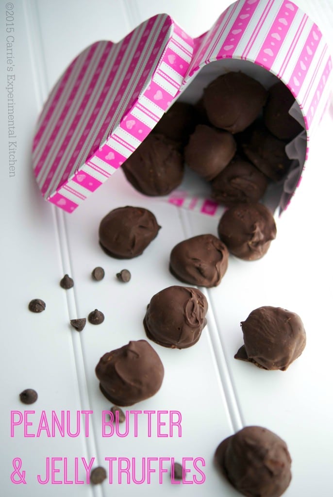 Peanut Butter & Jelly Truffles made from creamy peanut butter and your favorite jelly; then dipped in dark chocolate.