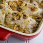 A close up of chicken parisienne in a red baking dish.