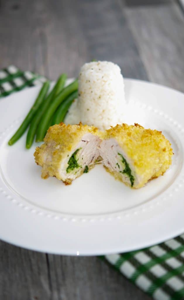 A plate of Turkey Kiev on a table