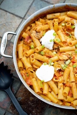 Pasta, sun dried tomatoes, grilled chicken and mushrooms in a tomato cream sauce topped with ricotta cheese.