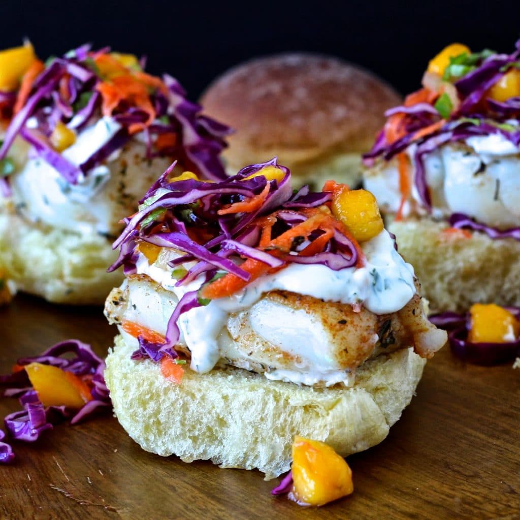 A close up of a piece of cake on a plate, with Seafood and Slider