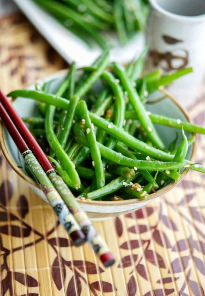 Enjoy a simple, flavorful vegetable side dish with an Asian flair with this quick and easy recipe for Sesame Ginger Sautéed Haricot Verts.