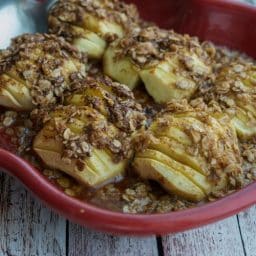 Hasselback Apples in a red apple dish.