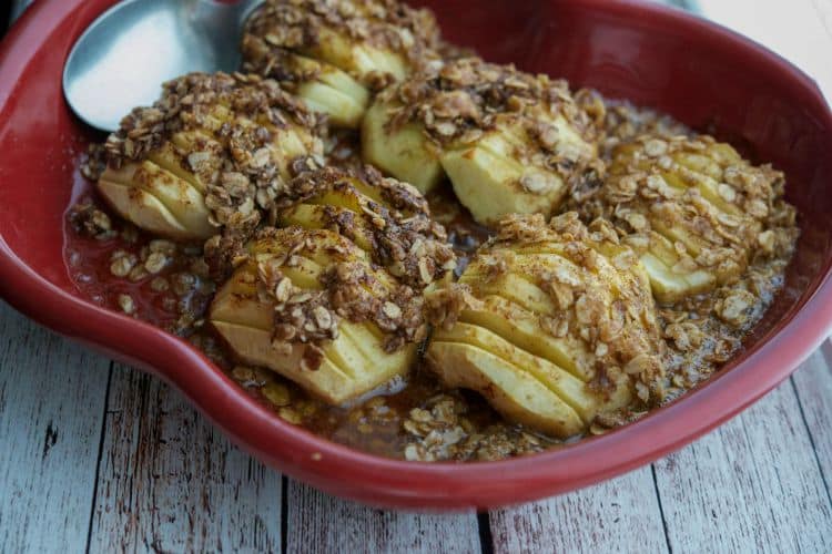 Hasselback Apples in a red apple dish. 
