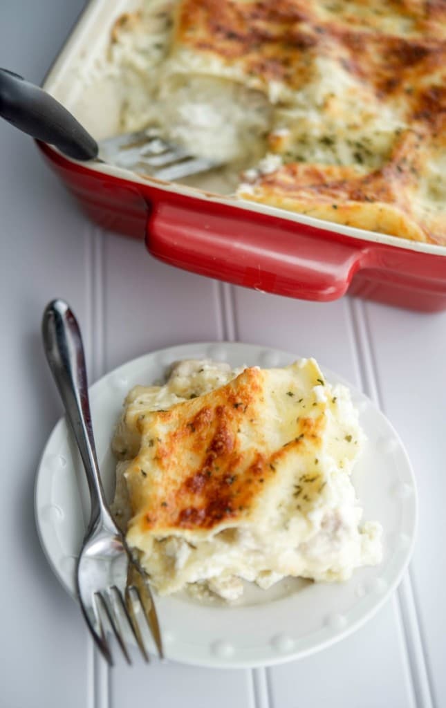 A piece of Chicken Francaise Lasagna on a plate. 