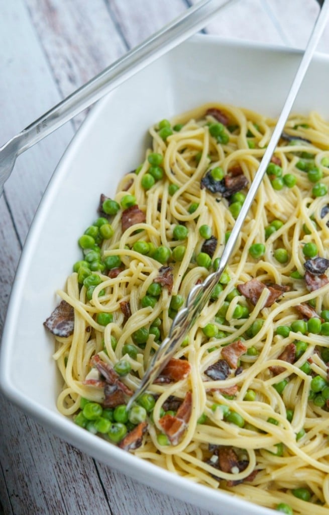 Spaghetti Carbonara in a white pasta bowl.