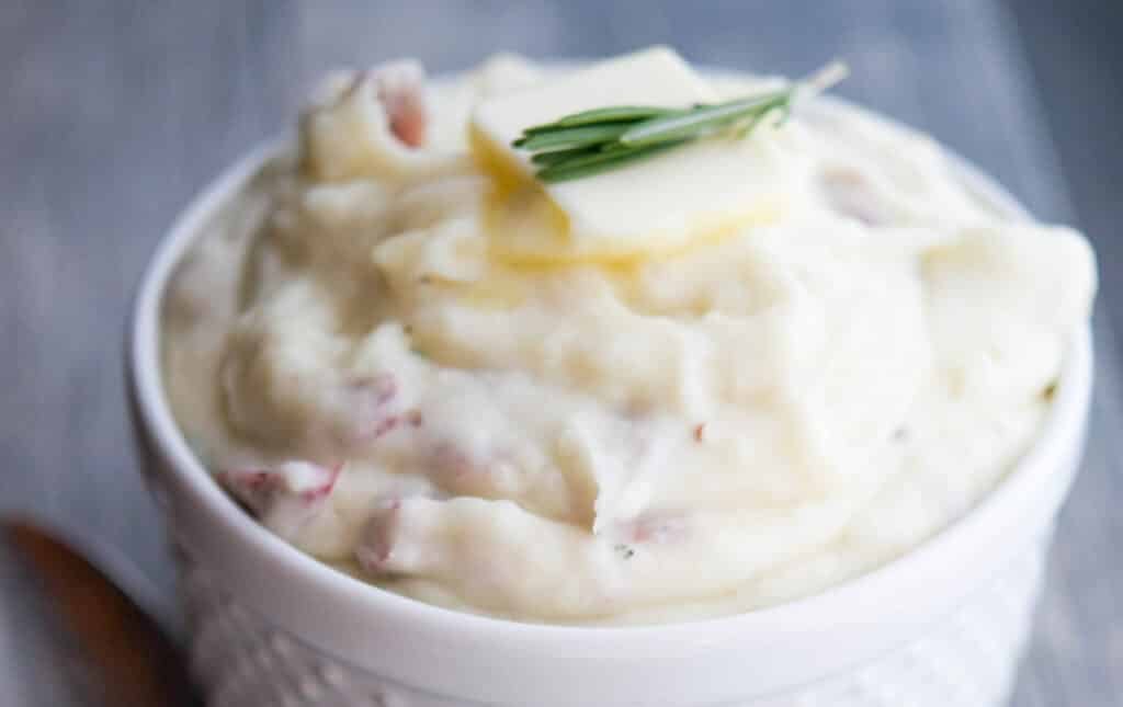 A close up of a Parmesan Rosemary Whipped Potatoes