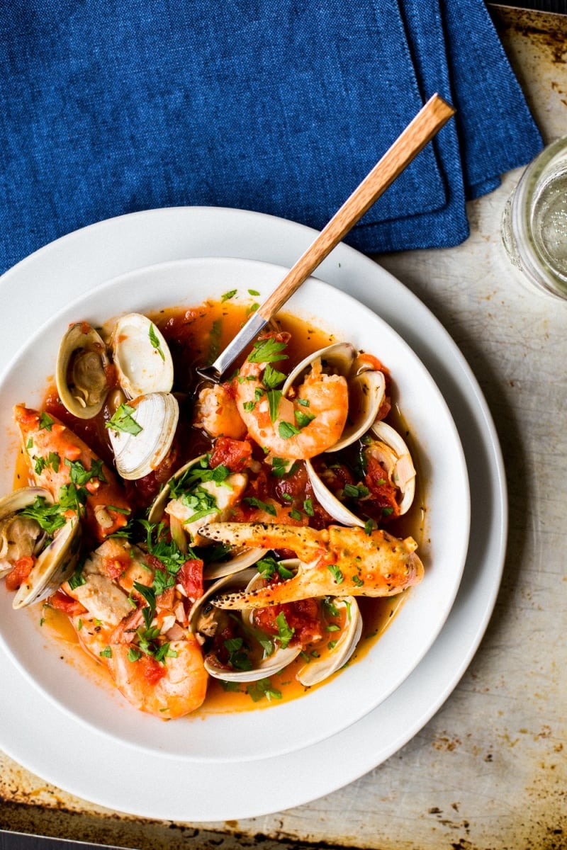 A plate of food on a table, with Shrimp and Seafood