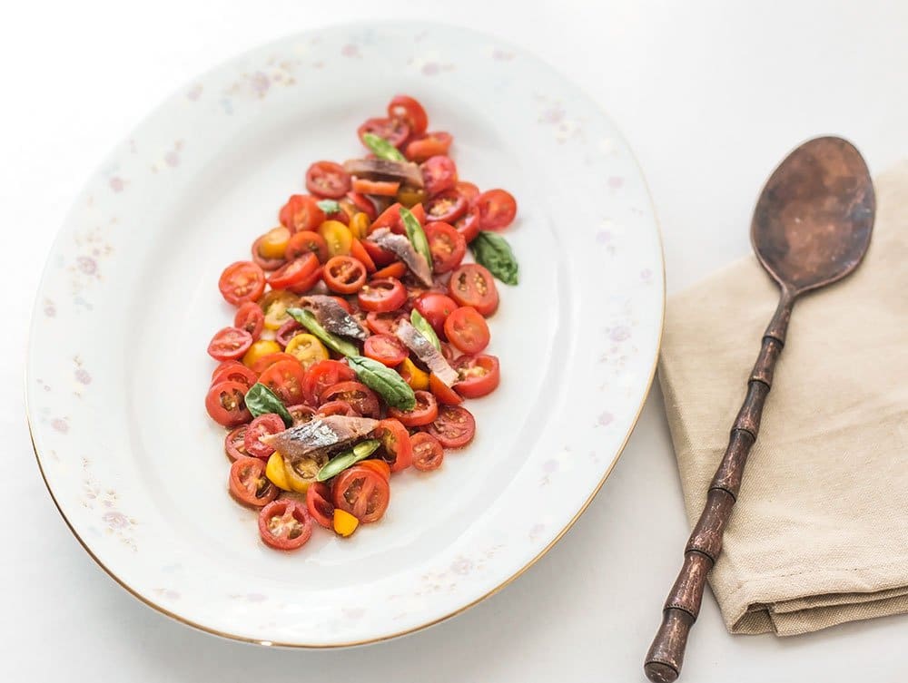 A bowl of food on a plate, with Seafood and Christmas Eve