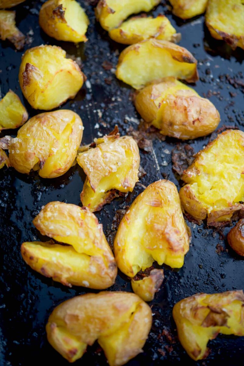 Sea Salt Smashed Potatoes made with baby potatoes, olive oil and salt are a simple, tasty side dish that dresses up any meal. 