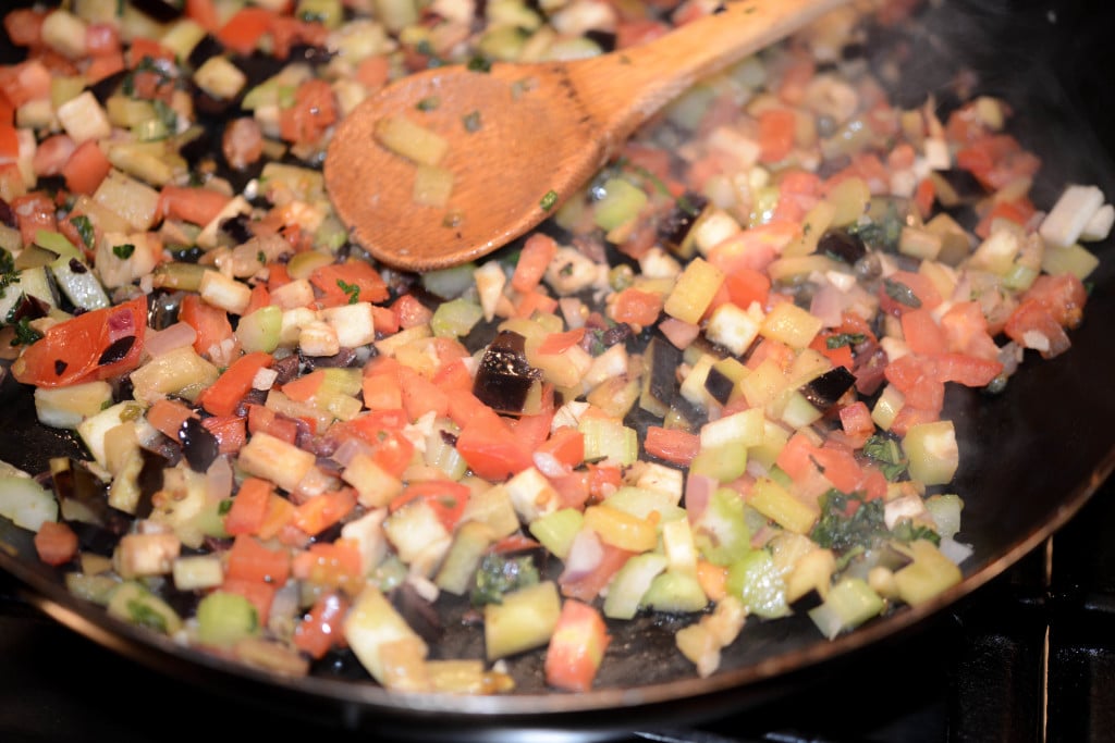 Eggplant Caponata vegetables in a skillet.