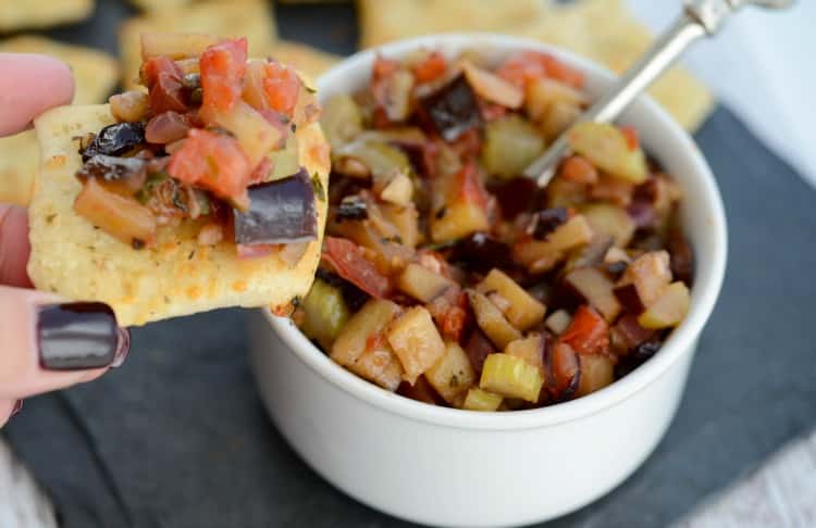 Eggplant Caponata in a white dish.