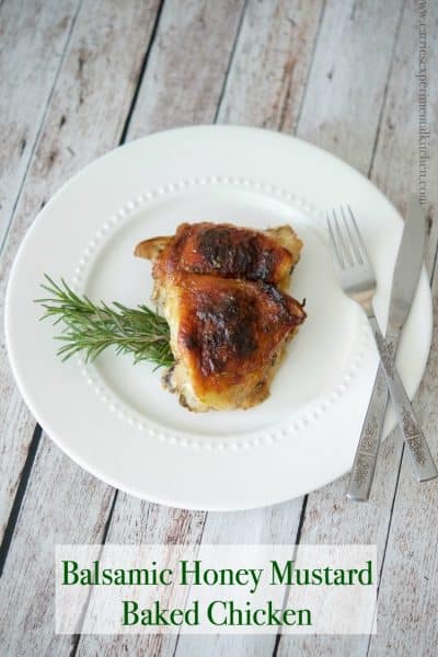 Balsamic Honey Mustard Baked Chicken Thighs on a white plate.