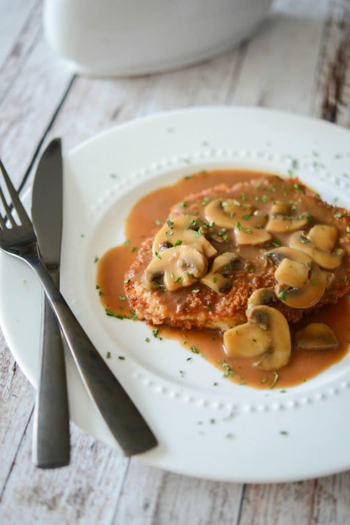 Jägerschnitzel is a German or Austrian dish made of pork or veal cutlets; then topped with a mushroom, brown gravy. 