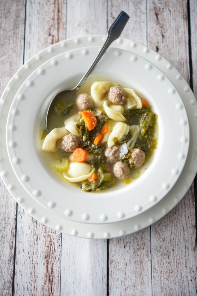 Tortellini Escarole Soup is my variation of Italian Wedding soup. It's so hearty , that it's more like a stew than a soup. 