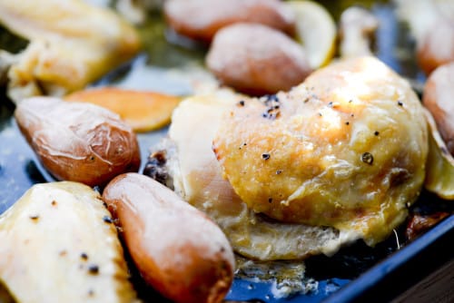 Chicken Vesuvio - This easy sheet pan dinner is made with chicken, garlic, lemon, and potatoes. The recipe was created by Carrie at Carrie's Experimental Kitchen as part of her guest post on basilmomma.com