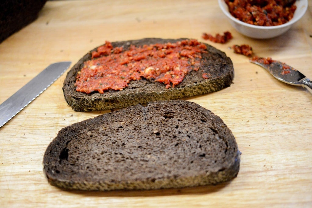 Sun dried tomato pesto on pumpernickel