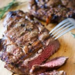 This Tuscan-Style Grilled Rib Eye Steak marinated in fresh rosemary, garlic, balsamic vinegar and olive oil is so tender, it will melt in your mouth.
