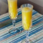 Champagne and orange juice make up this simple Mimosa perfect for weekend brunch.