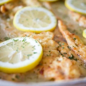 A close up of food, with Chicken and Lemon