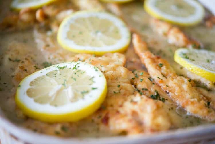 A close up of food, with Chicken and Lemon