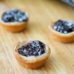 Blueberry Pie Tassies are a simple, small bite sized dessert, similar to a cream cheese cookie; then filled with your favorite pie filling.