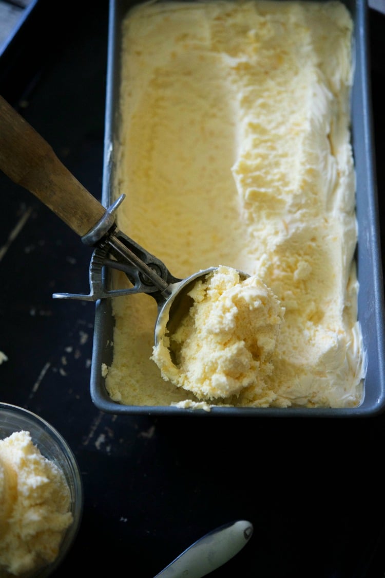 Mango Ice Cream made with sweet mangoes, heavy cream, milk, sugar and vanilla makes the perfect summertime frozen treat.