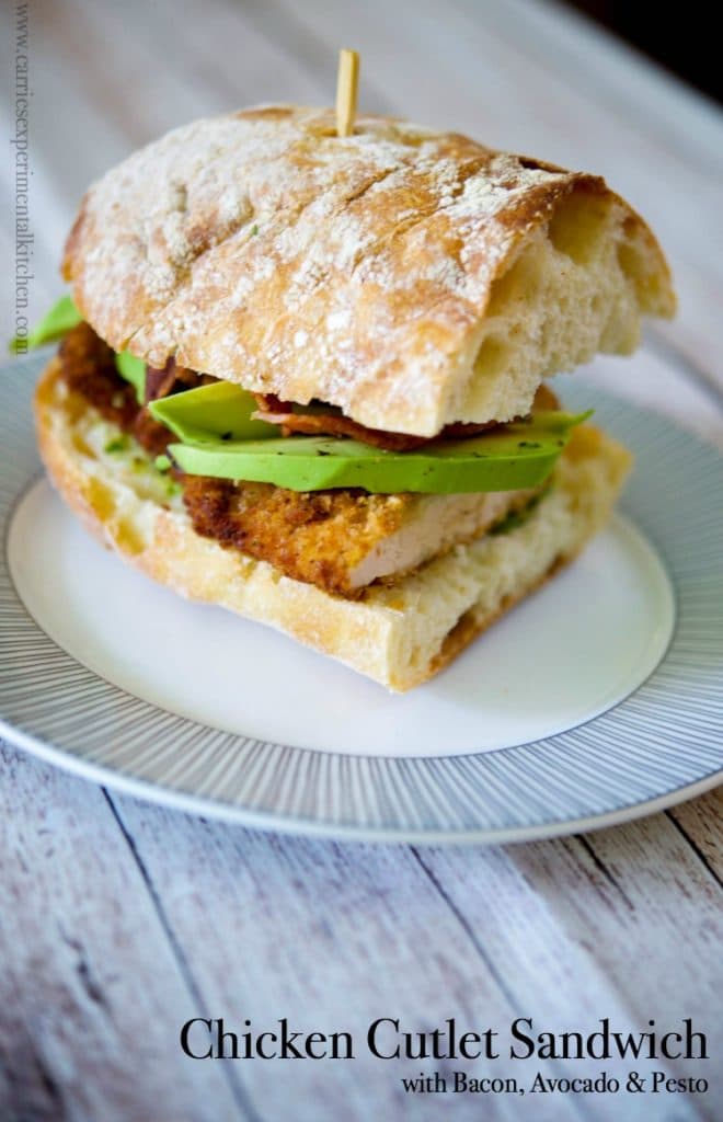 This Chicken Cutlet Sandwich with crispy bacon, ripe avocados and pesto on Ciabatta bread is so hearty, it's perfect for lunch or dinner. 