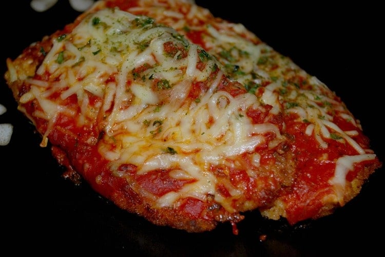 A close up of chicken parmesan.