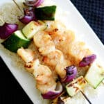 Dijon Maple Grilled Shrimp Skewers are marinated in maple syrup and Dijon mustard; then skewered with fresh garden vegetables.