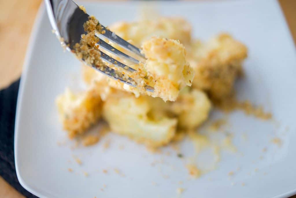 Cheesy Cauliflower Casserole on a fork.