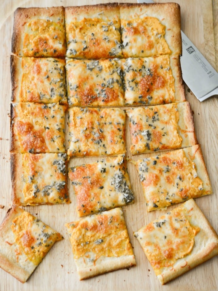 Pumpkin Ricotta Flatbread will become your new favorite Fall recipe. It's perfect for Friday pizza night or weekend game day snacking.