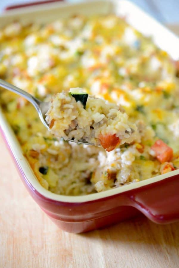 Ground sausage, garden fresh zucchini, tomatoes & garlic combined with rice to make a tasty weeknight casserole the entire family will love.