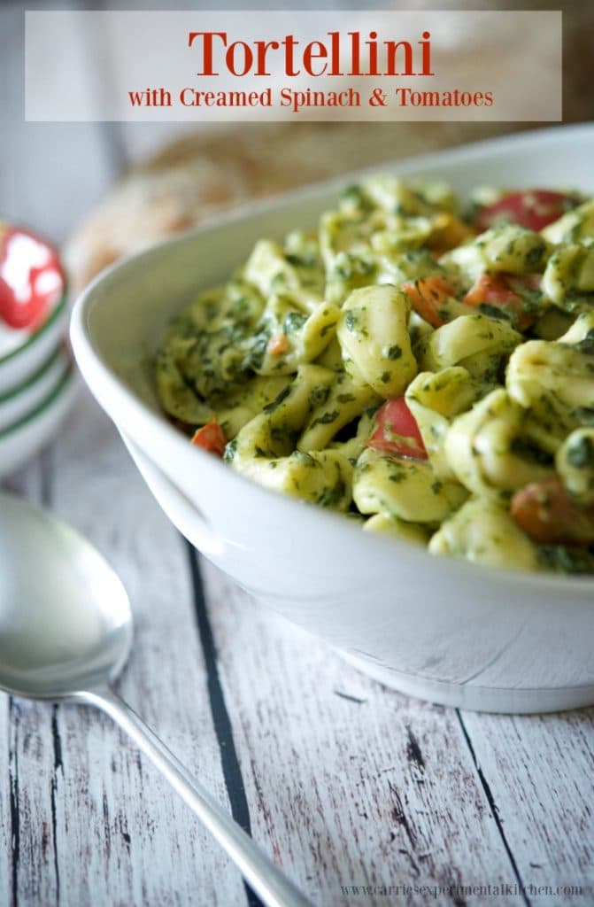 Cheese filled tortellini pasta cooked al dente; then lightly tossed in a creamy spinach and tomato sauce is a deliciously quick weeknight meal. 