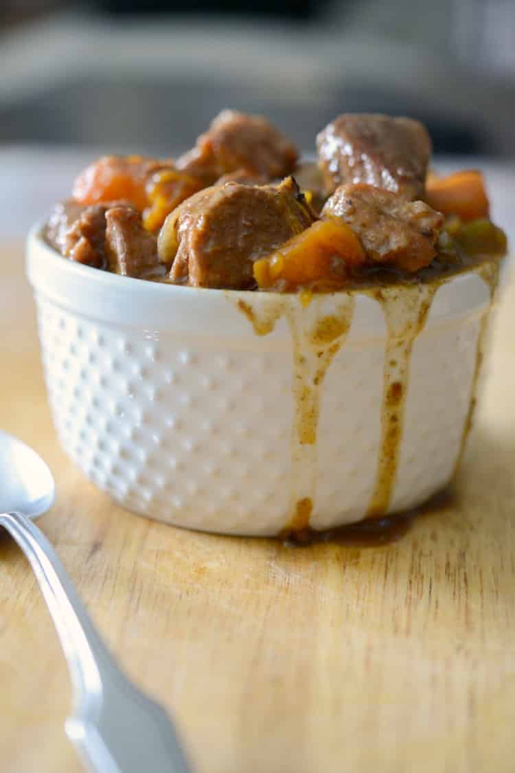 A close up of Hungarian Pork Stew in a white bowl.