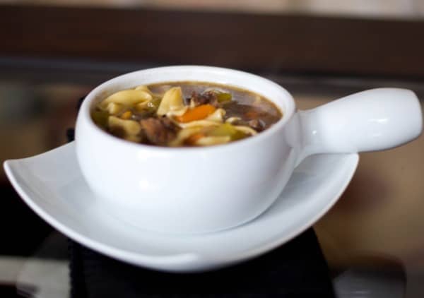 Beef Noodle Soup in a white soup bowl.