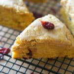 It's pumpkin season and these Whole Wheat Pumpkin Cranberry Scones are deliciously moist and perfect for breakfast or an afternoon snack.