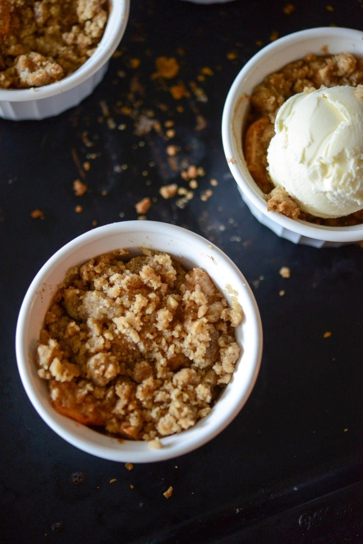 Fireball Apple Crumble made with sweet apples tossed with Fireball whiskey, cinnamon & sugar; then topped with a buttery crumb topping.