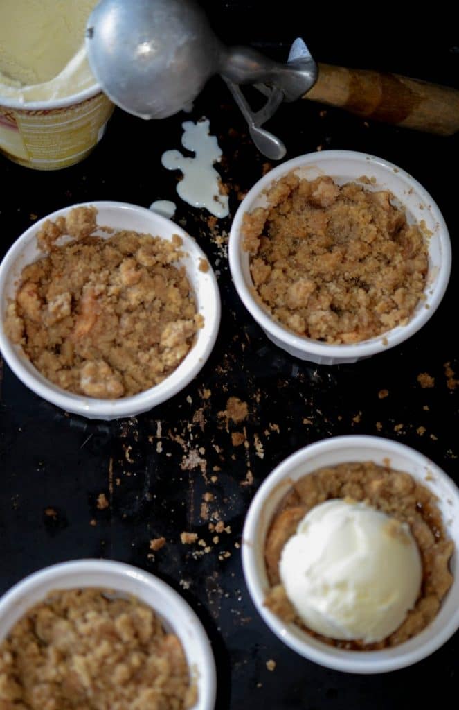 Fireball Apple Crumble made with sweet apples tossed with Fireball whiskey, cinnamon & sugar; then topped with a buttery crumb topping. 