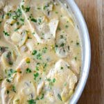 Boneless Chicken pan seared; then simmered in a creamy mushroom brandy sauce in a skillet.