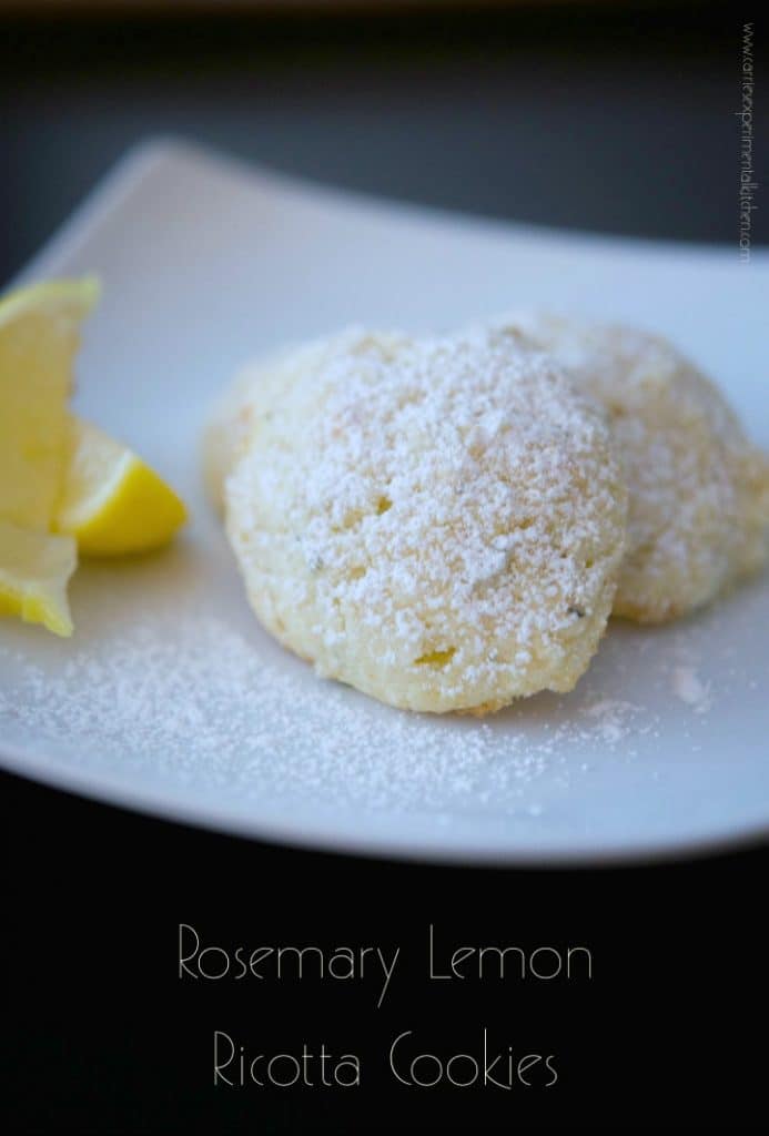 A close up of food on a plate, with Lemon and Cookie