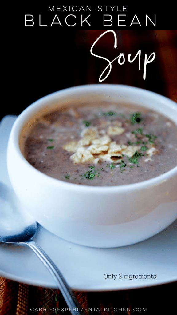 black bean soup in a white crock