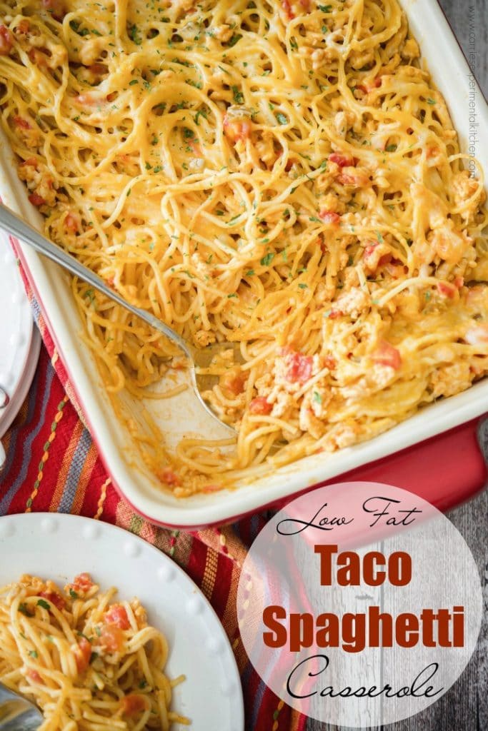 Taco Spaghetti Casserole with a scoop out of the dish.